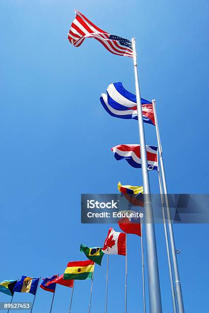 A Line Of Flags From Different Countries Stock Photo - Download Image Now - American Flag, Bahamas, Barbados