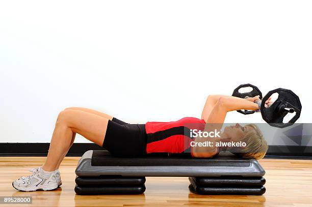 Health And Fitness Woman Lifting Weights Stock Photo - Download Image Now - Active Lifestyle, Adult, Alternative Medicine