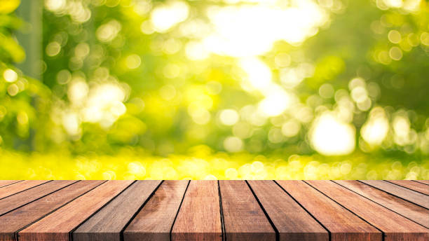 istock Abstract wooden floor with bokeh nature background. 895285230