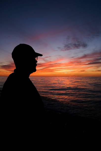 istock Man Watching Lake Superior Sunset 2 89528880