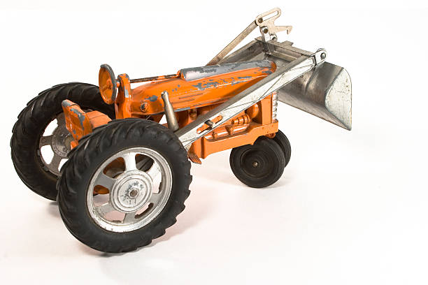 istock Antique Toy Tractor Isolated on White Background 89528933