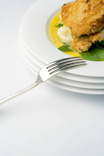 chicken schnitzel; porträt mid mit gabel - mashed potato food staple vertical color image stock-fotos und bilder