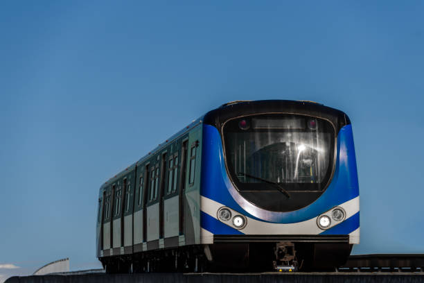 istock modern blue train carriage on the sky background 895300710