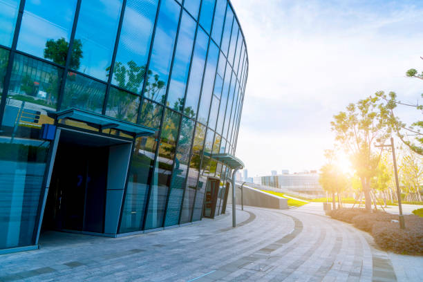 istock Square floor tile and modern architectural landscape glass and exterior wall background 895307784