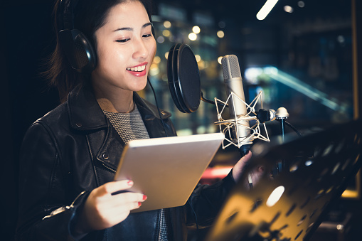 Recording Studio, Singing, Microphone,Chinese Ethnicity,Young Woman, Digital Tablet