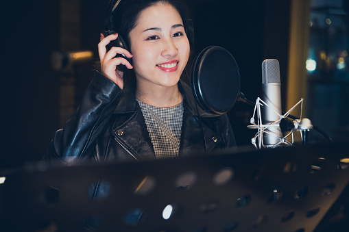 Recording Studio, Singing, Microphone,Chinese Ethnicity,Young Woman, Digital Tablet