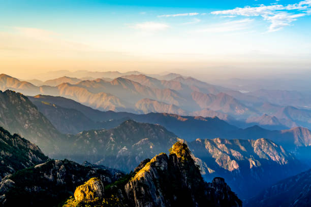 istock Chinese Mount Huangshan beautiful sunrise morning and distant background 895314830