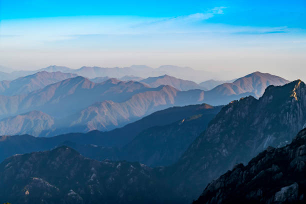 istock Chinese Mount Huangshan beautiful sunrise morning and distant background 895314894