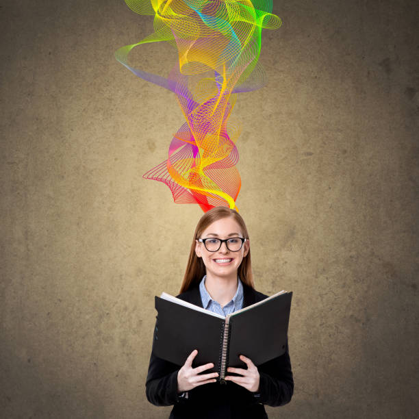 istock Excited businesswoman holding diary 895317016