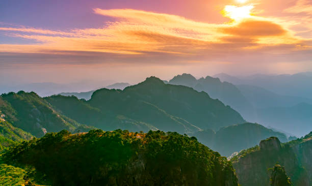 istock Chinese Mount Huangshan beautiful sunrise morning and distant background 895319528