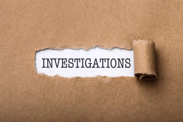 istock Paper Tear With Word Investigations 895329312