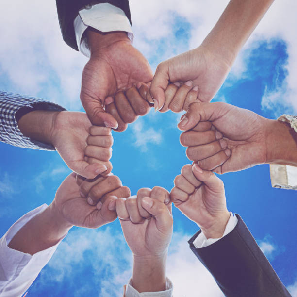 istock Diverse People Hands Fists Together Partnership 895341116