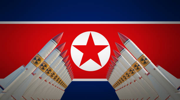 nuclear missiles over north korean flag - north korea hydrogen bomb korea missile imagens e fotografias de stock