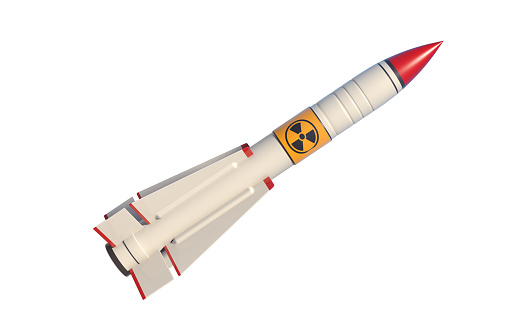 Nuclear missile isolated on white background. Horizontal composition with copy space and selective focus. Clipping path is included. Nuclear war concept.