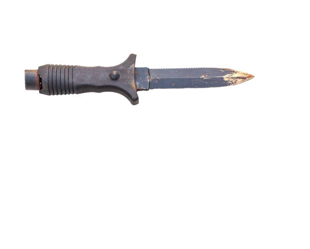 istock Worn abd Battered Diving and Combat Knife 895351866