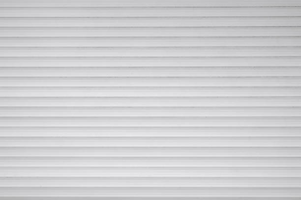 istock Abstract background texture of light metal surface in pinstripe 895392012