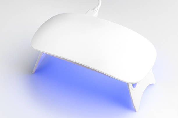 istock UV lamp lights for nails on a white background 895392398