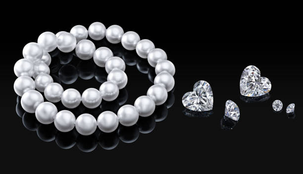 istock Luxury set white pearl necklace and diamonds on a black background with glossy reflection and blank  template for your design  or copy space  your text 895392400