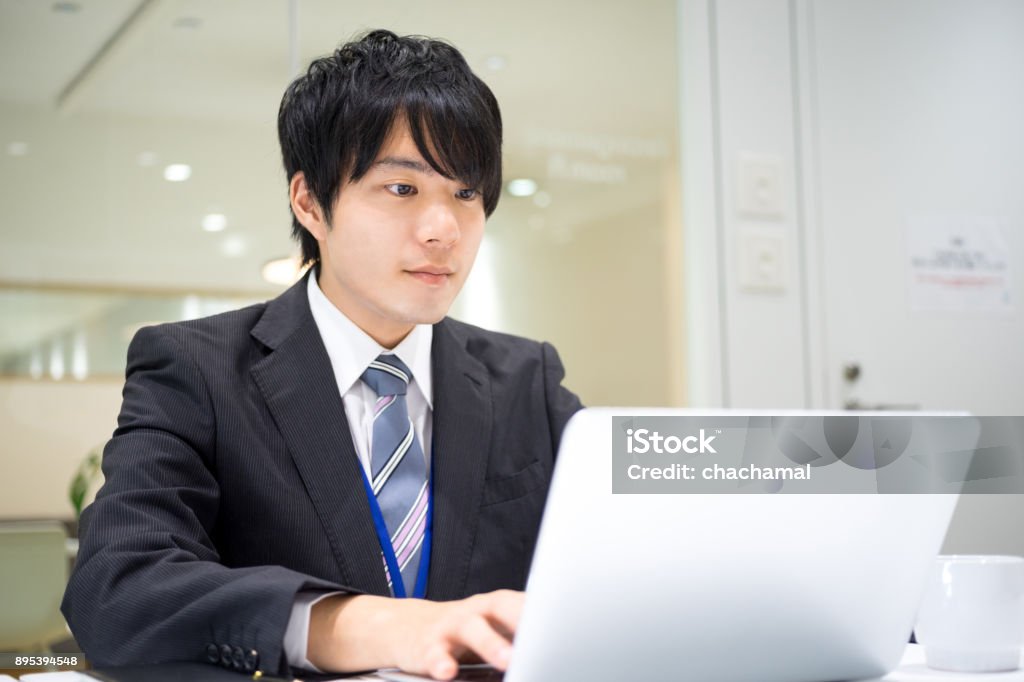 Business image (male · office · serious) It is Business image (male · office · serious). Laptop Stock Photo