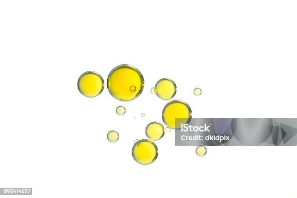 Yellow Oil Bubbles Stock Photo - Download Image Now - Cooking Oil, Olive Oil, Drop