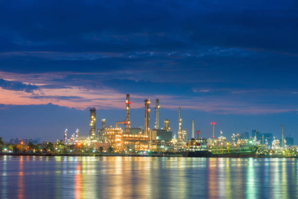 istock Oil and Gas refinery plant and loading dock at twilight 895429804