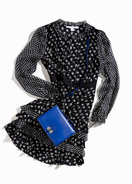 istock Women’s dress with handbag isolated on white background 895451604