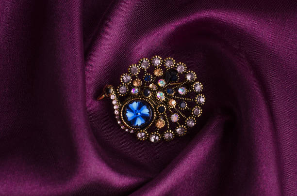 istock brooch with diamonds bird, turkey on silk 895454380