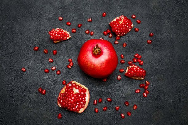 istock Pomegranate and seeds close-up 895462252