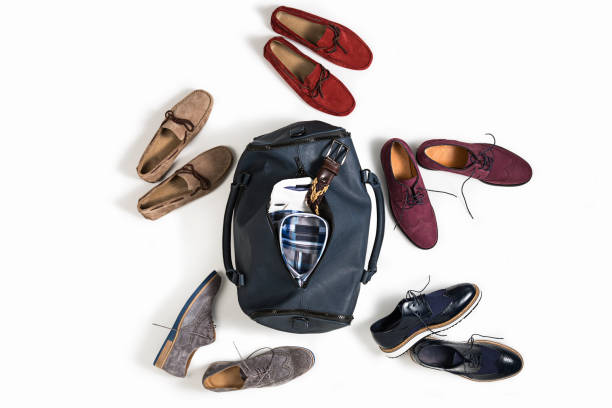 istock Men shoes with bag isolated on white background 895462446