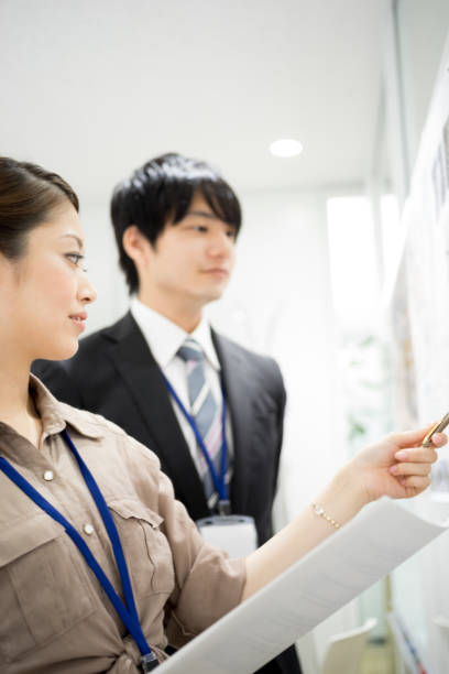 istock Image of the meeting (whiteboard · male · female) 895468778