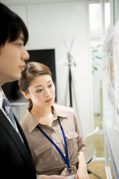 istock Image of the meeting (whiteboard · male · female) 895469294
