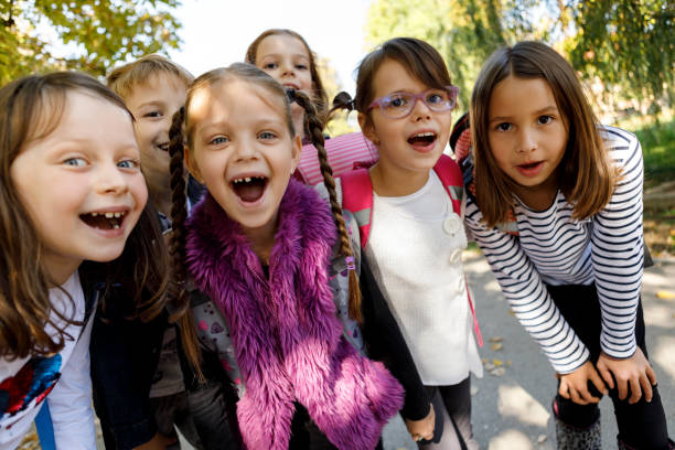 istock Cheerful kids screaming outside 895472470