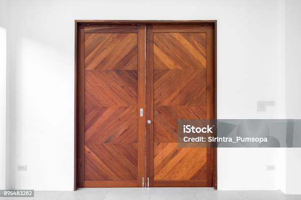 Brown Double Wood Door On White Wall Background Stock Photo - Download Image Now - Door, Wood - Material, Front Door