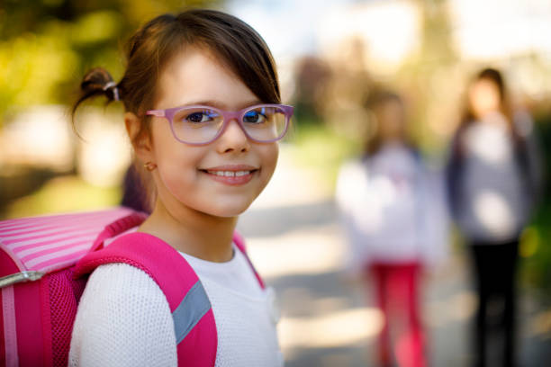 istock Cute little schoolgirl 895484692