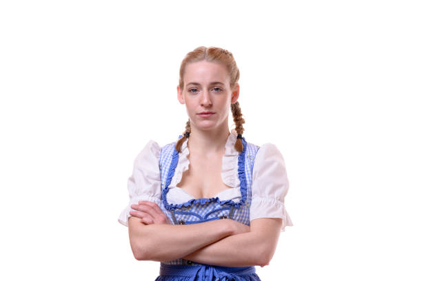 Beer Fest Dirndl with traditional necklace on wooden ground. copy space