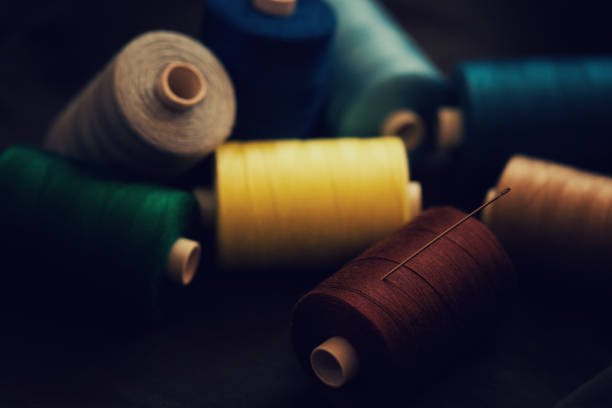 istock Pile of colorful spools of thread 895496730