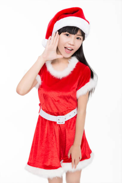 istock cheerful christmas girl,studio shot 895504706