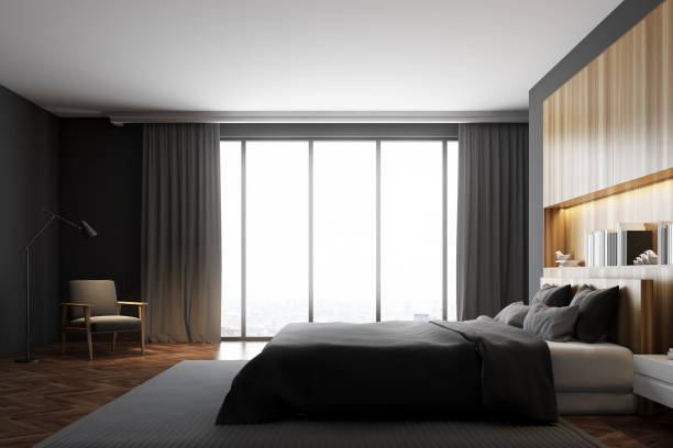 istock Gray and wooden bedroom interior, window 895507294