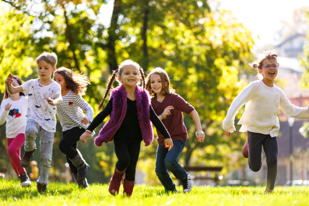istock Children having fun outdoor 895519262
