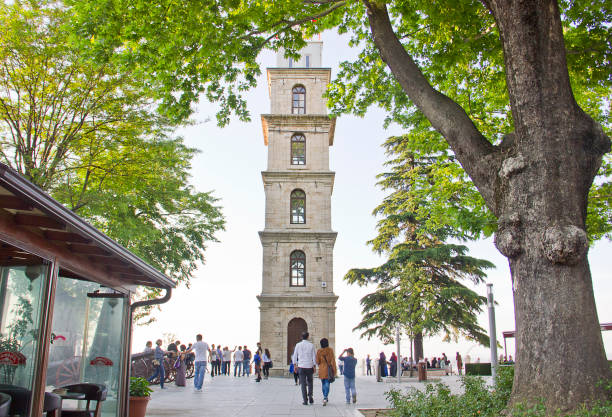 Bursa, Turkey - May 14, 2017: Osman gazi and Orhan gazi Tombs located in Tophane region in Bursa and there is a clock tover in tophane at Osmangazi Bursa Turkey. People visits Tophane to see tombs and clock tower which was built by ottomans.
