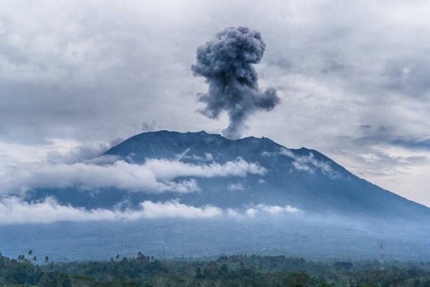 istock Agung volcano eruption view near rice fields, Bali, Indonesia 895523396