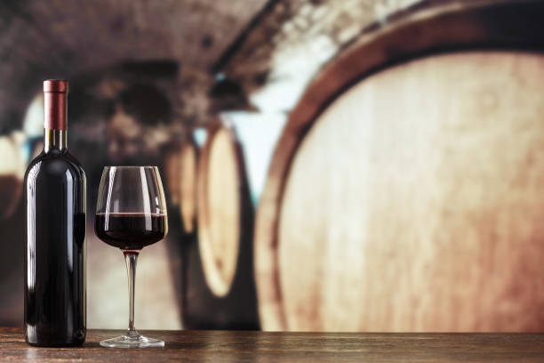 istock Wine cellar with wine bottle and glasses. 895525322
