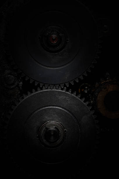 istock Contact line of two gearwheel cogs 895528736
