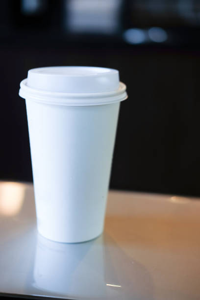istock White paper cup of coffee in coffee shop 895539376
