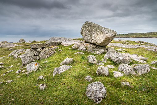 This is an isolated stone in the Dunbria mountains of La Coruna, Spain, which is a tourist attraction.