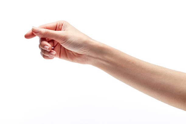 istock woman's hand measuring invisible items. Isolated on white 895590646
