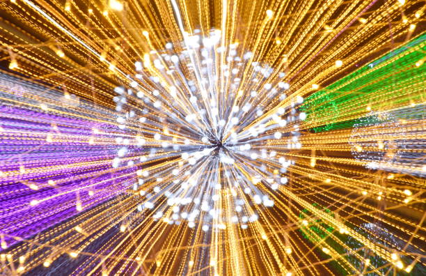 istock blurry colorful light spreading by zoom technique background 895591626