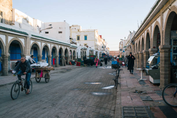 Essaouira, Morocco, December 2, 2017: The medina of Essaouira (Mogador). Street full of small arts and crafts businesses, in the morning, before opening.nturies.