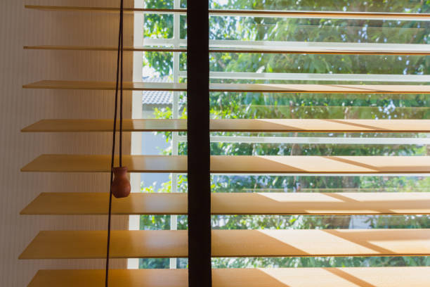 istock brown wood curtain control lighting at window 895613560