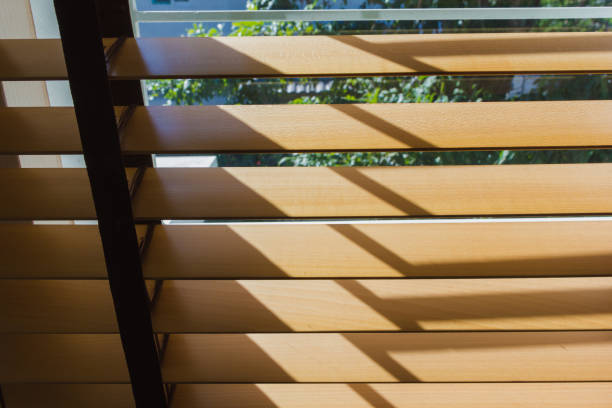 istock brown wood curtain control lighting at window 895613564